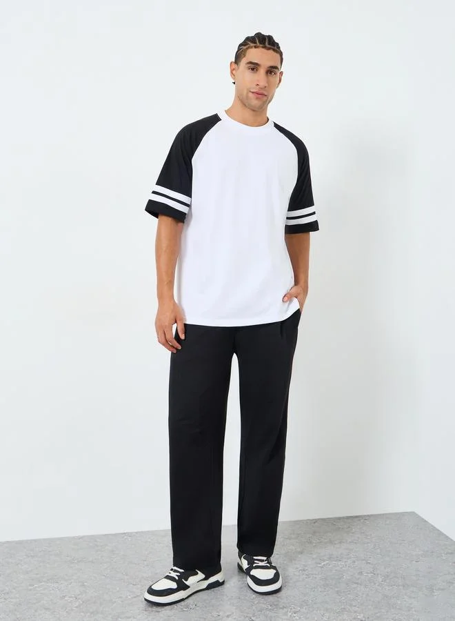 Styli Men Color Block Raglan Sleeve Oversized T-Shirt